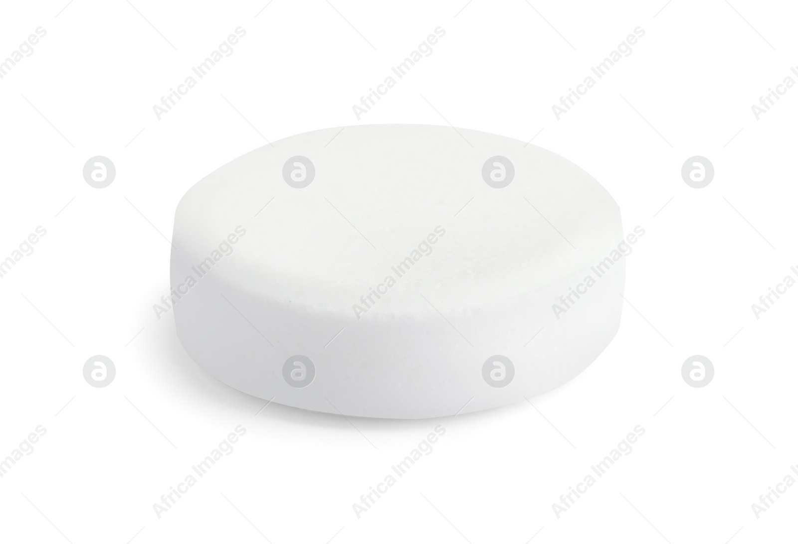 Photo of One round pill on white background. Medicinal treatment