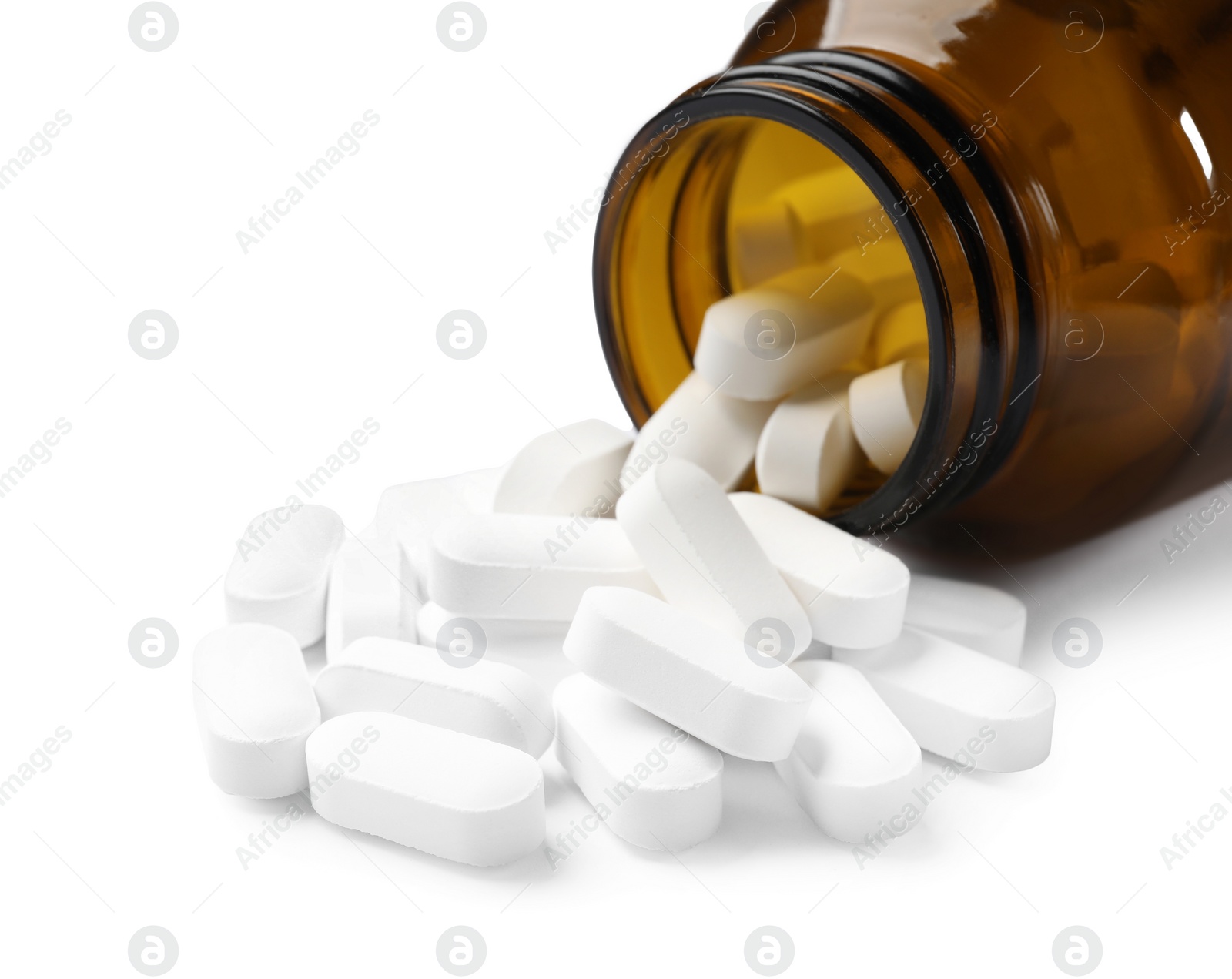 Photo of Bottle with vitamin capsules isolated on white