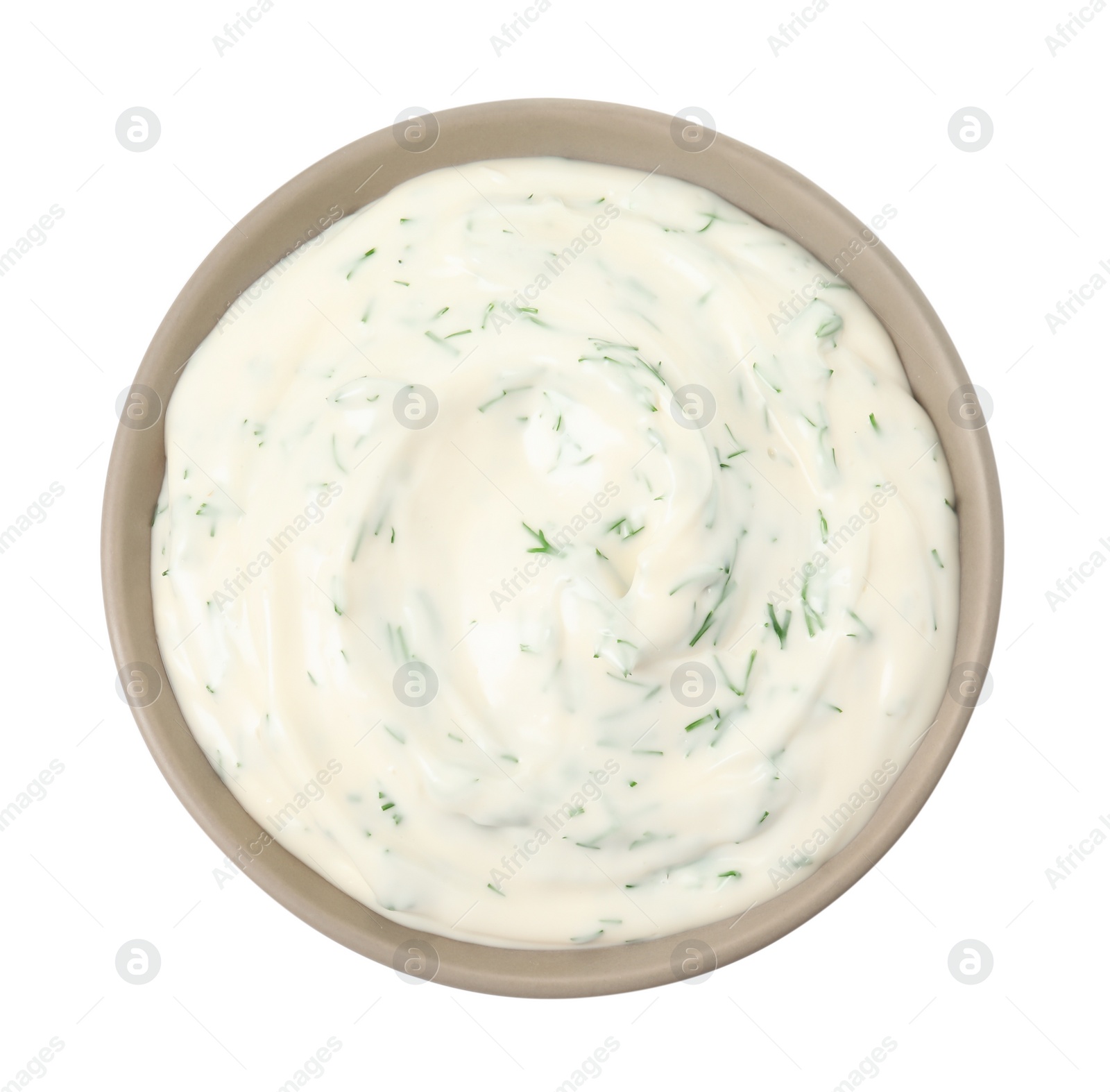 Photo of Tasty creamy dill sauce in bowl isolated on white, top view