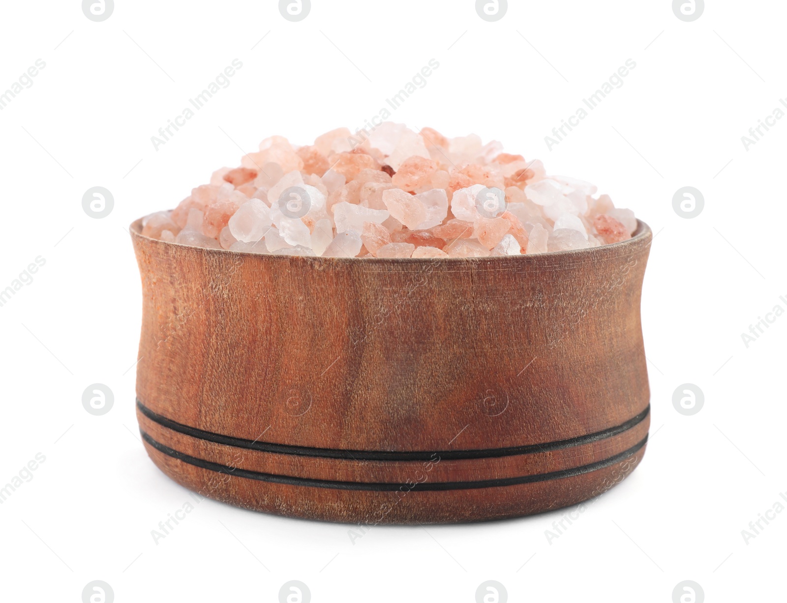 Photo of Pink Himalayan salt in wooden bowl isolated on white