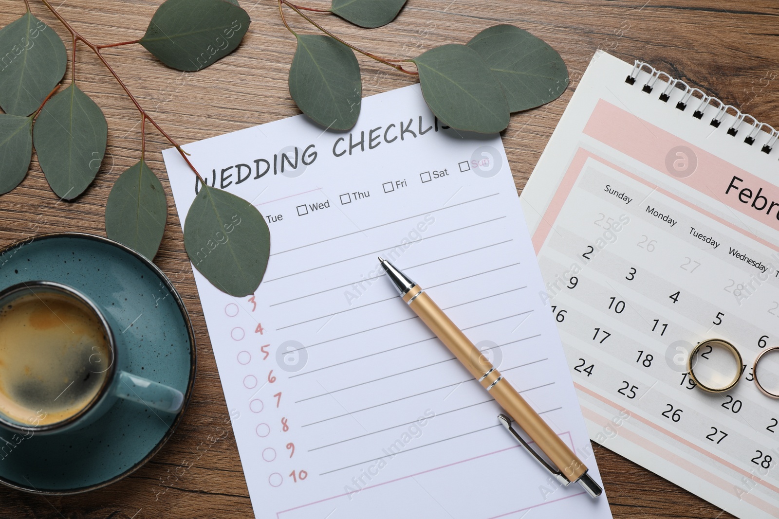 Photo of Flat lay composition with Wedding Checklist and calendar on wooden table