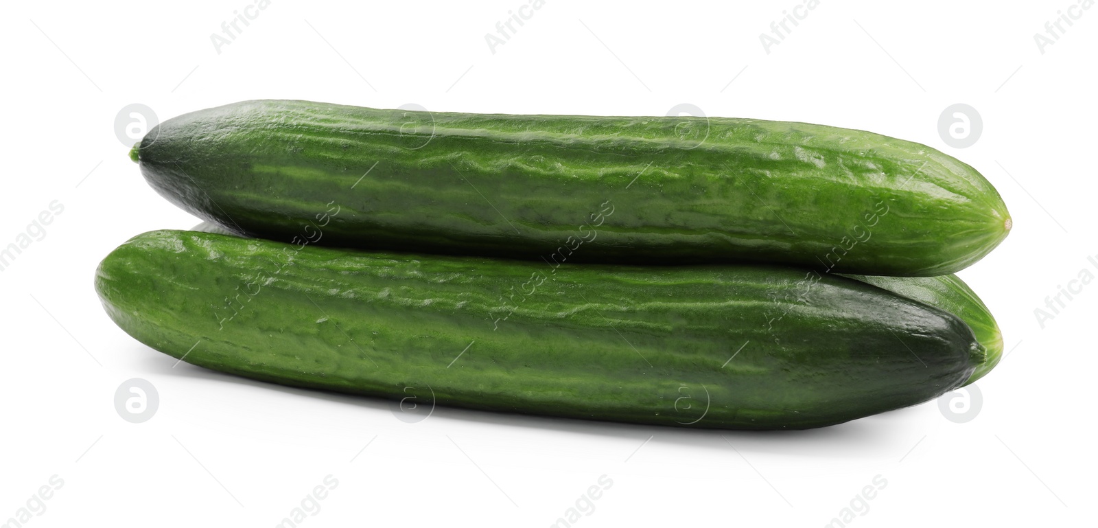 Photo of Many long fresh cucumbers isolated on white