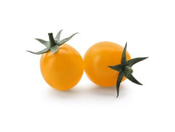 Photo of Ripe yellow cherry tomatoes on white background