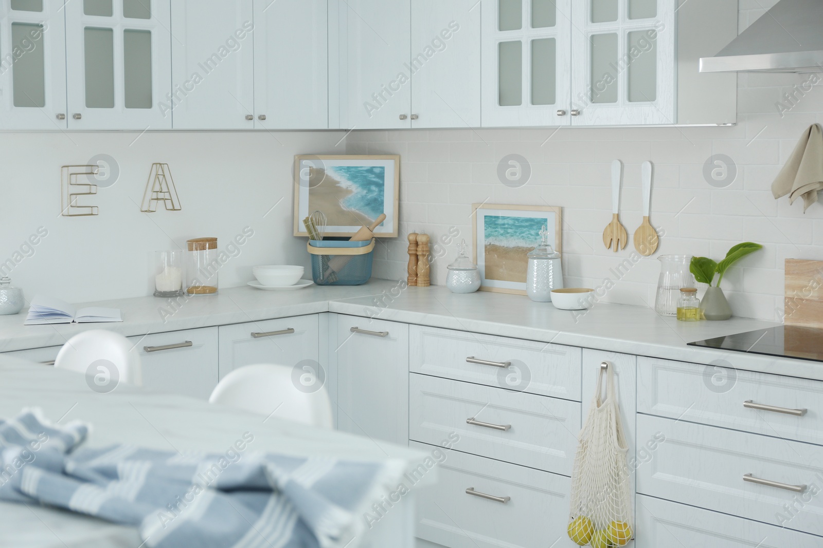 Photo of Beautiful kitchen interior with new stylish furniture