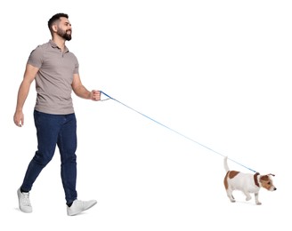 Image of Smiling man walking with dog on white background