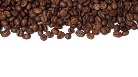 Many roasted coffee beans on white background, top view