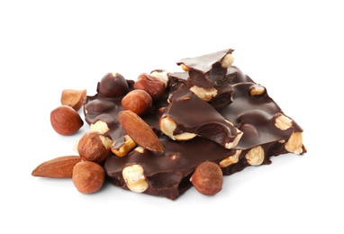 Delicious black chocolate with nuts on white background