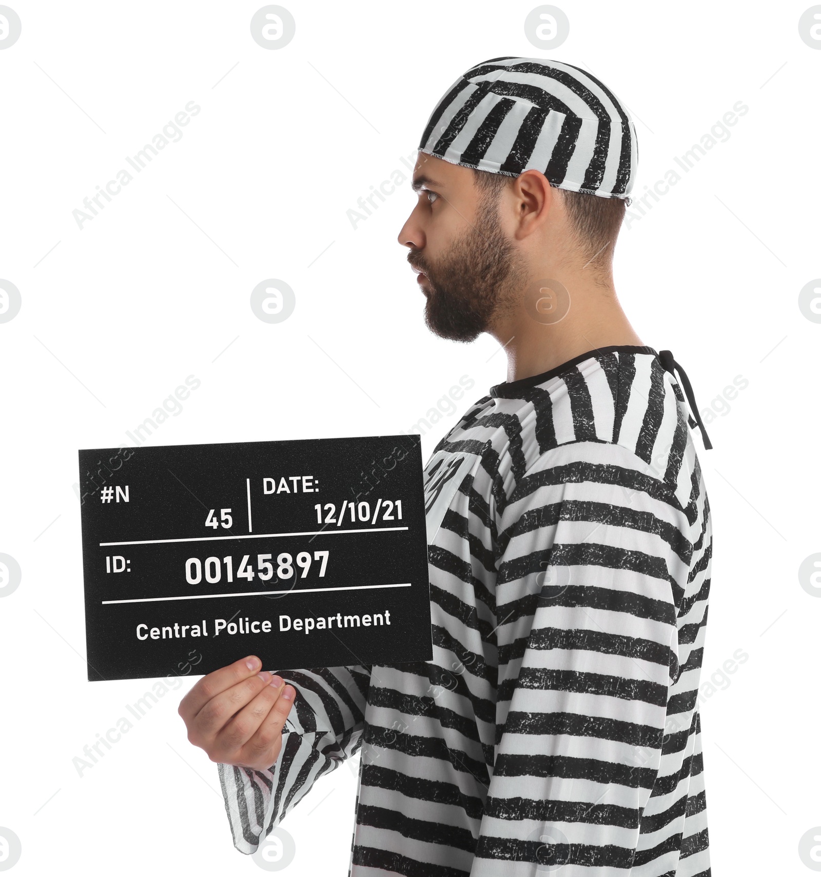 Photo of Prisoner in special uniform with mugshot letter board  on white background
