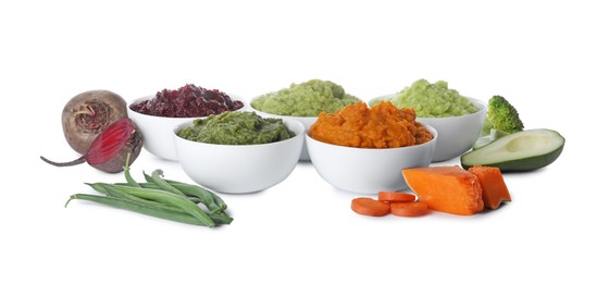 Photo of Different delicious puree in bowls and fresh ingredients on white background. Healthy food