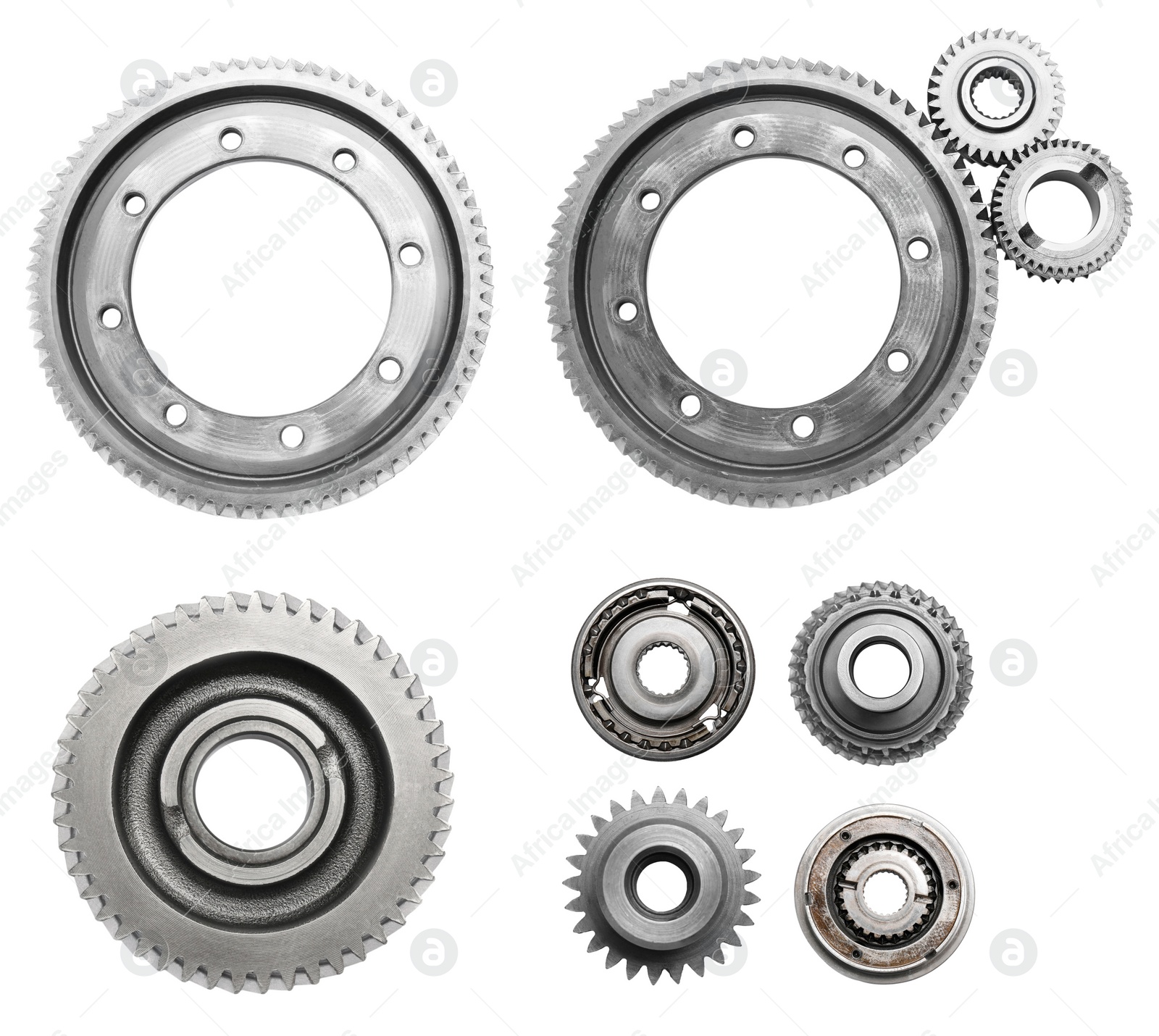 Image of Set with different stainless steel gears on white background, top view