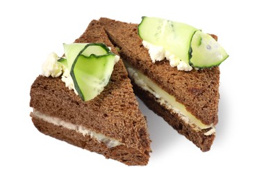 Photo of Tasty sandwiches with cucumber and cream cheese on white background
