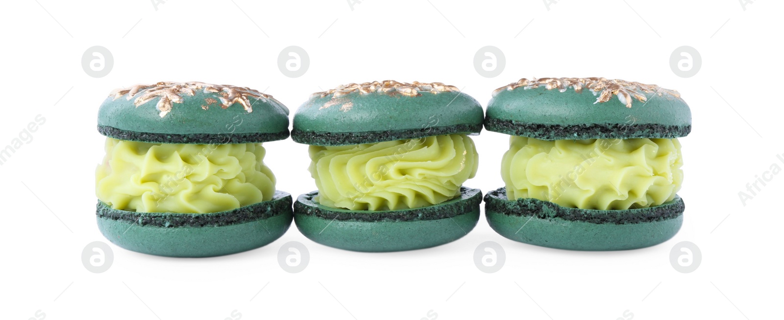 Photo of Beautifully decorated Christmas macarons isolated on white