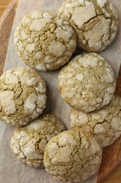 Tasty matcha cookies on table, top view