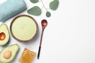 Photo of Homemade hair mask, towel and ingredients on white background, flat lay. Space for text