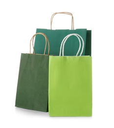 Mockup of paper shopping bags on white background