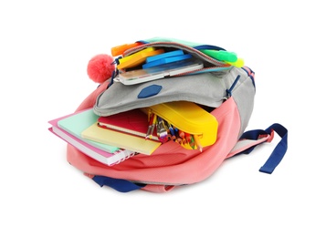 Backpack with school stationery on white background