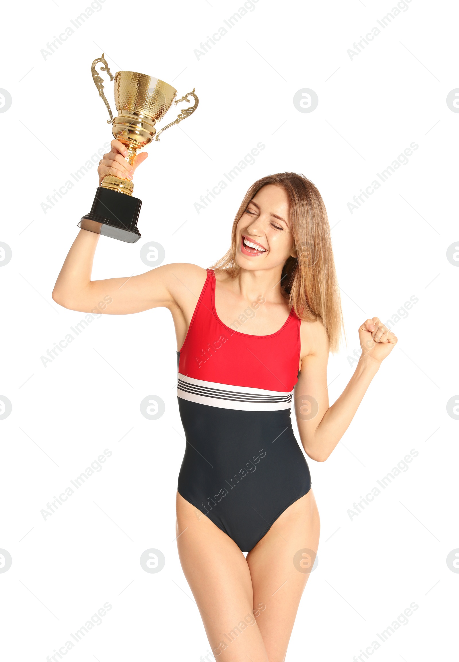 Photo of Happy young woman in swimwear holding golden cup on white background