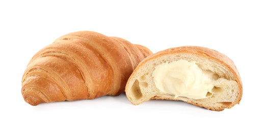 Photo of Delicious croissants with cream on white background