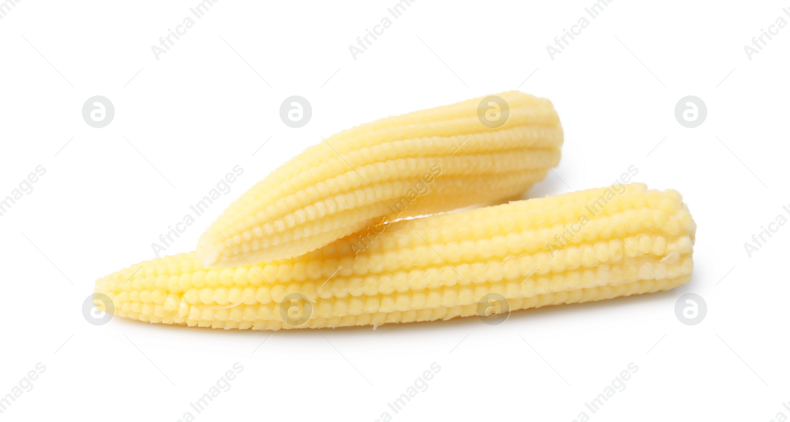 Photo of Tasty fresh baby corns isolated on white