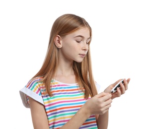 Photo of Teen girl using glucometer on white background. Diabetes control