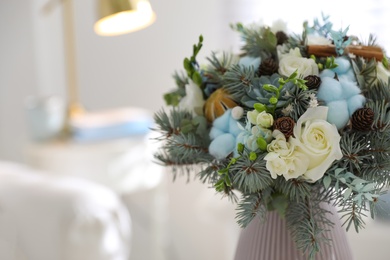 Beautiful wedding winter bouquet indoors, closeup. Space for text