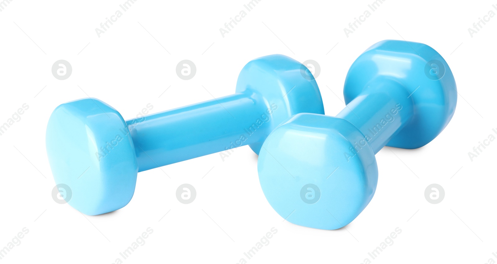 Photo of Light blue dumbbells isolated on white. Sports equipment