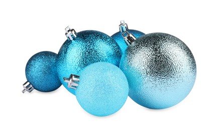 Beautiful light blue Christmas balls isolated on white