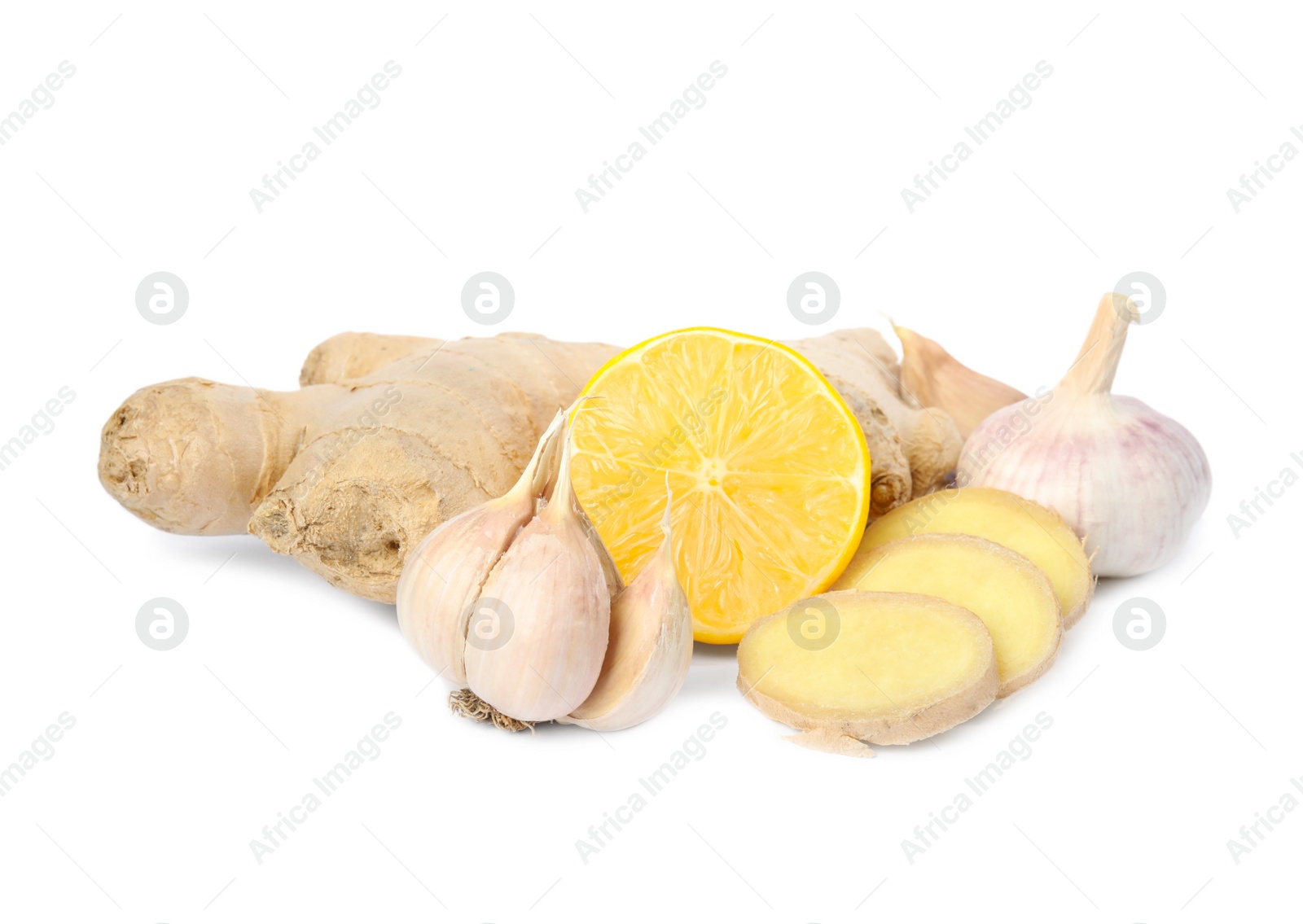 Photo of Fresh garlic and other natural cold remedies isolated on white