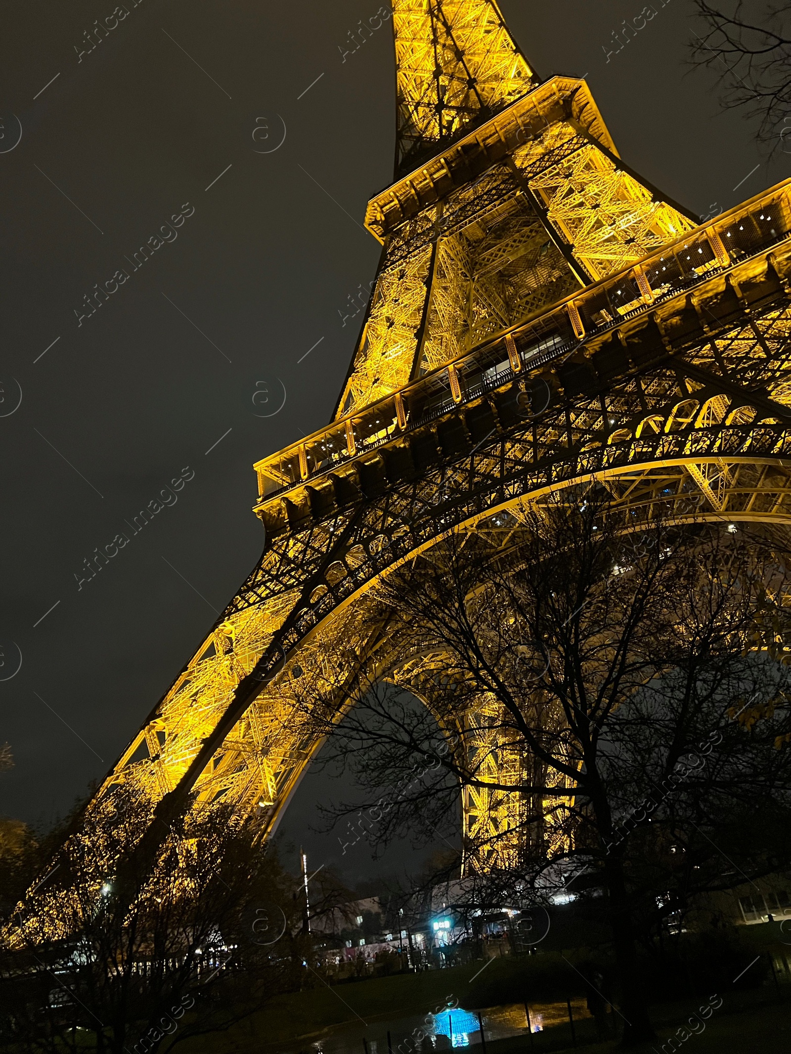 Photo of Beautiful illuminated Eiffel tower against night sky, low angle view