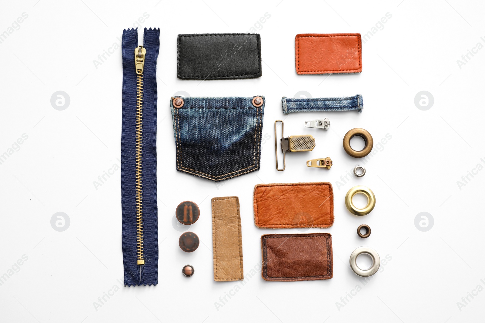 Photo of Composition with garment accessories and cutting details for jeans isolated on white, top view