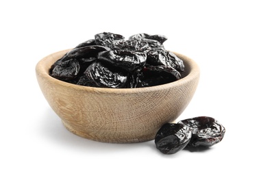 Bowl of tasty prunes on white background. Dried fruit as healthy snack