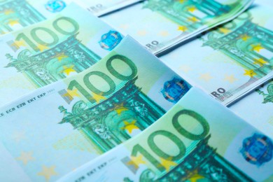 Photo of Euro banknotes as background, closeup. Money and finance