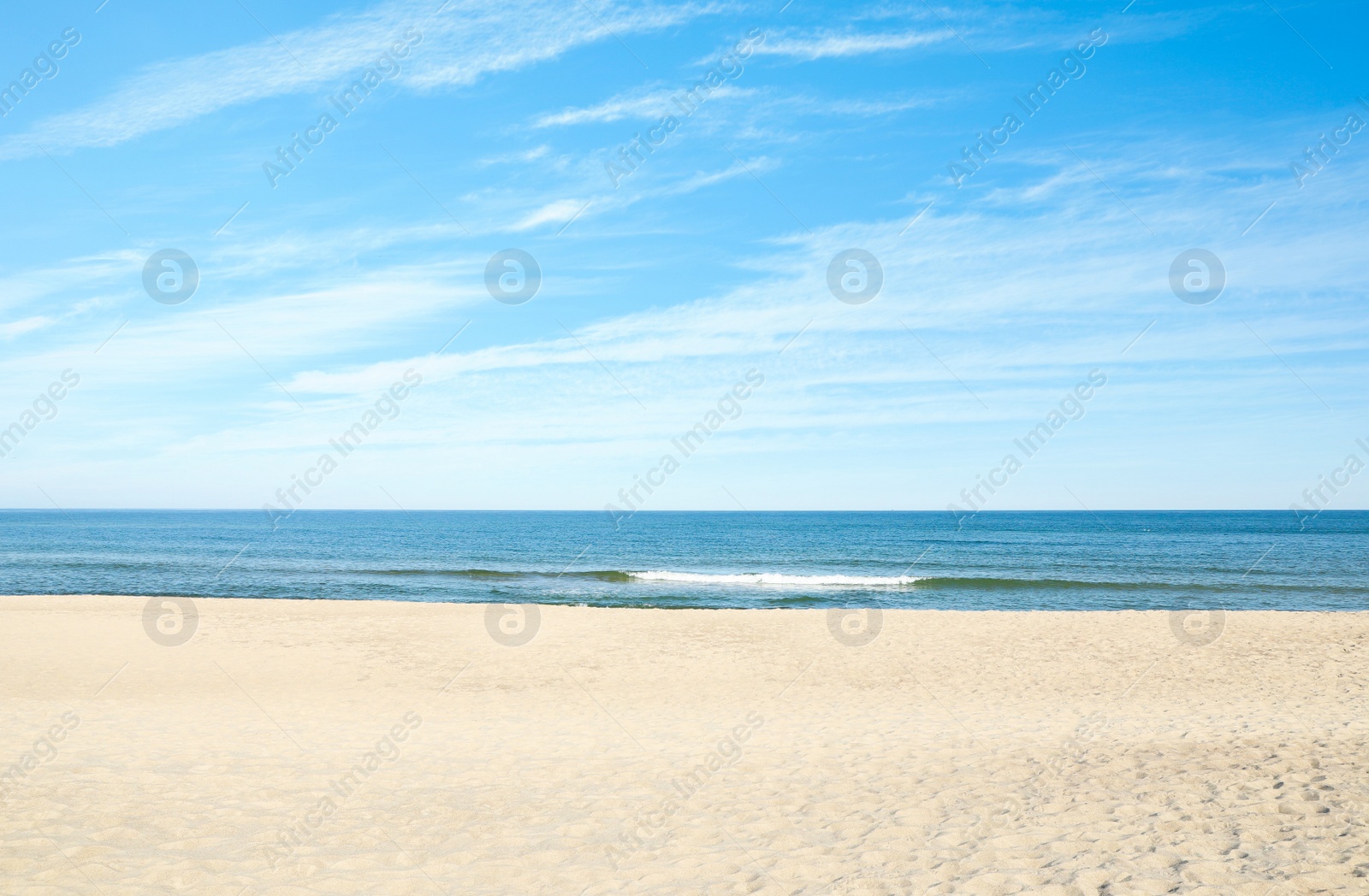 Photo of Picturesque view of sandy beach near sea