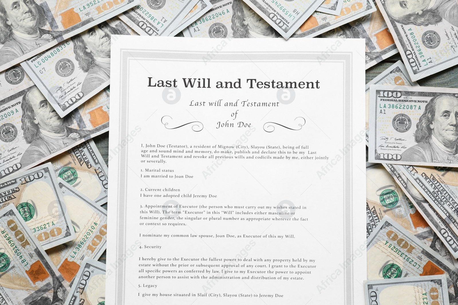 Photo of Last Will and Testament with dollar bills, top view