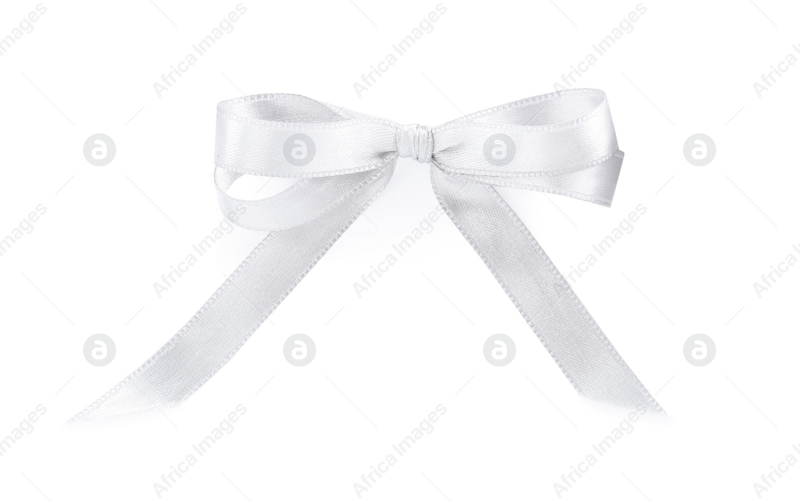 Photo of Beautiful ribbon tied in bow isolated on white, top view