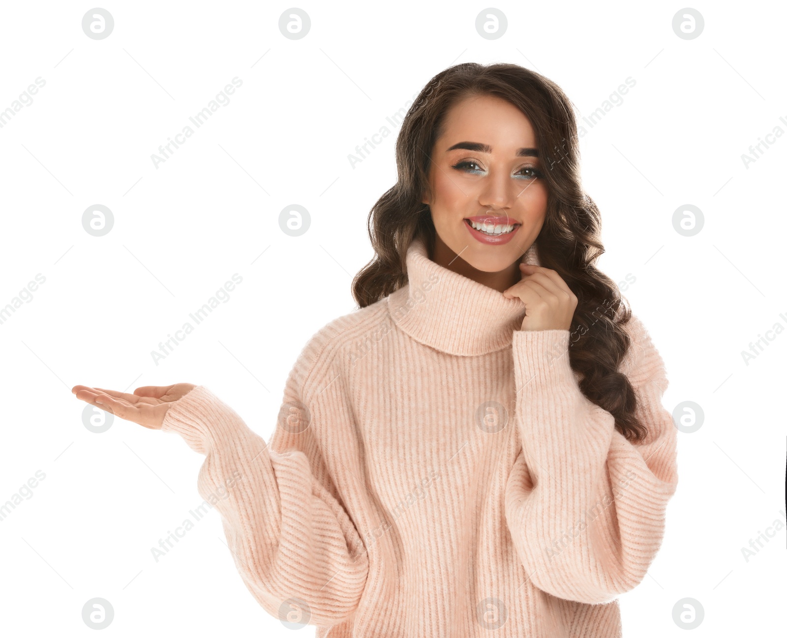 Photo of Beautiful young woman wearing warm sweater on white background. Christmas party