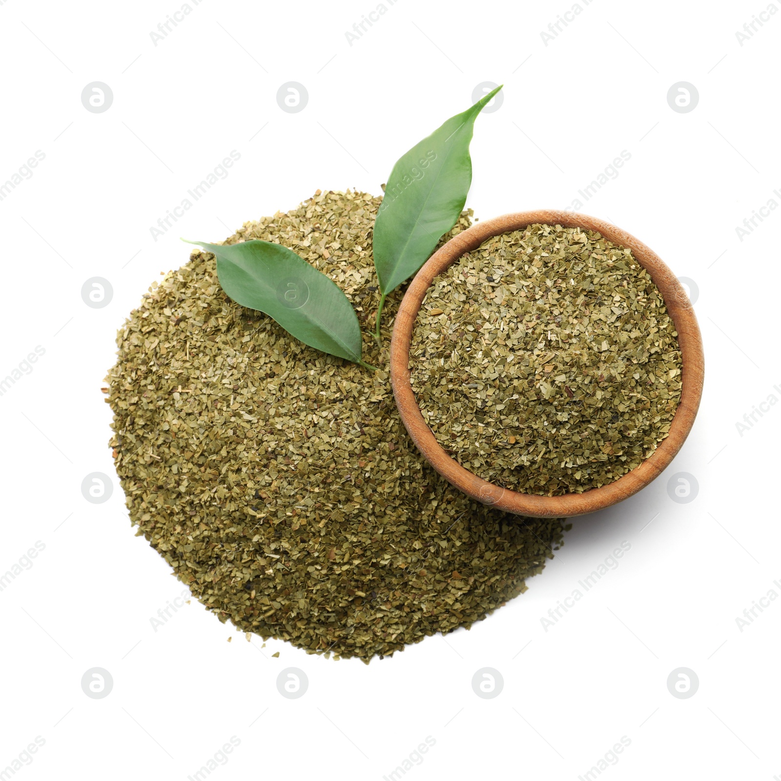 Photo of Wooden bowl with aromatic mate tea on white background, top view