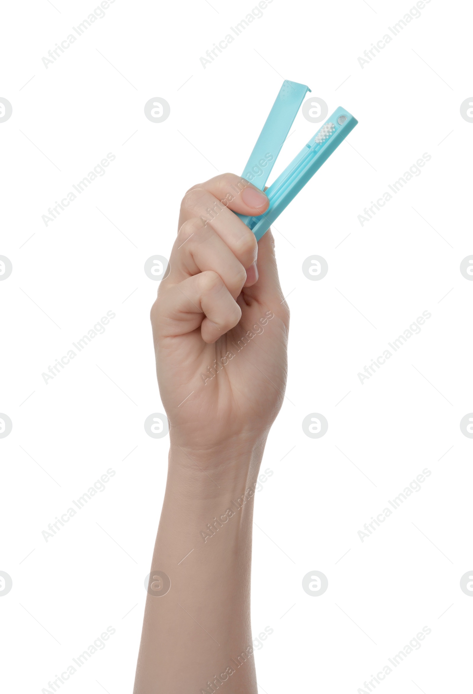 Photo of Woman holding reusable ear swab in case on white background, closeup. Conscious consumption
