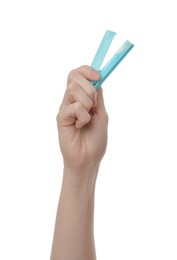 Photo of Woman holding reusable ear swab in case on white background, closeup. Conscious consumption