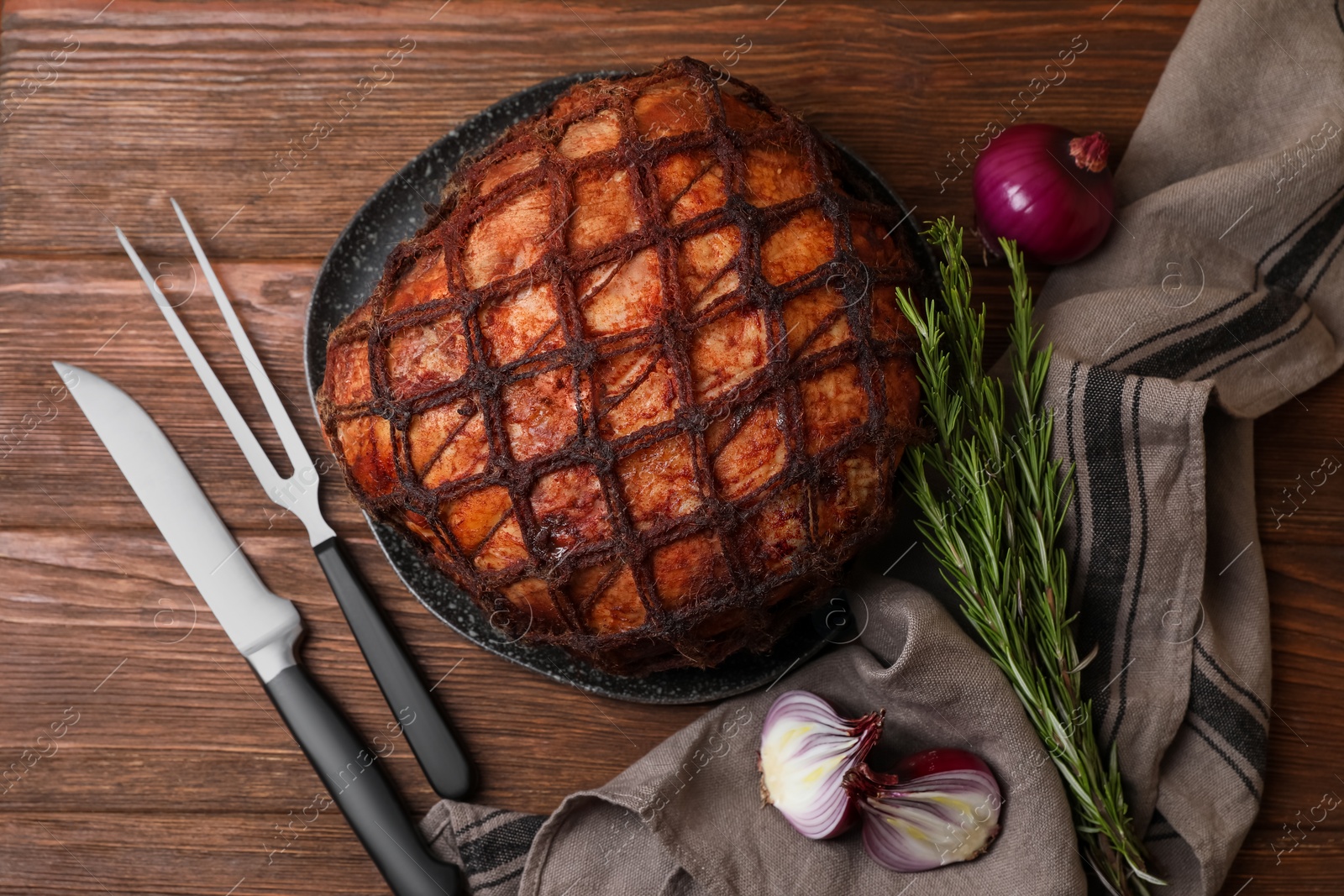 Photo of Delicious baked ham served on wooden table, flat lay