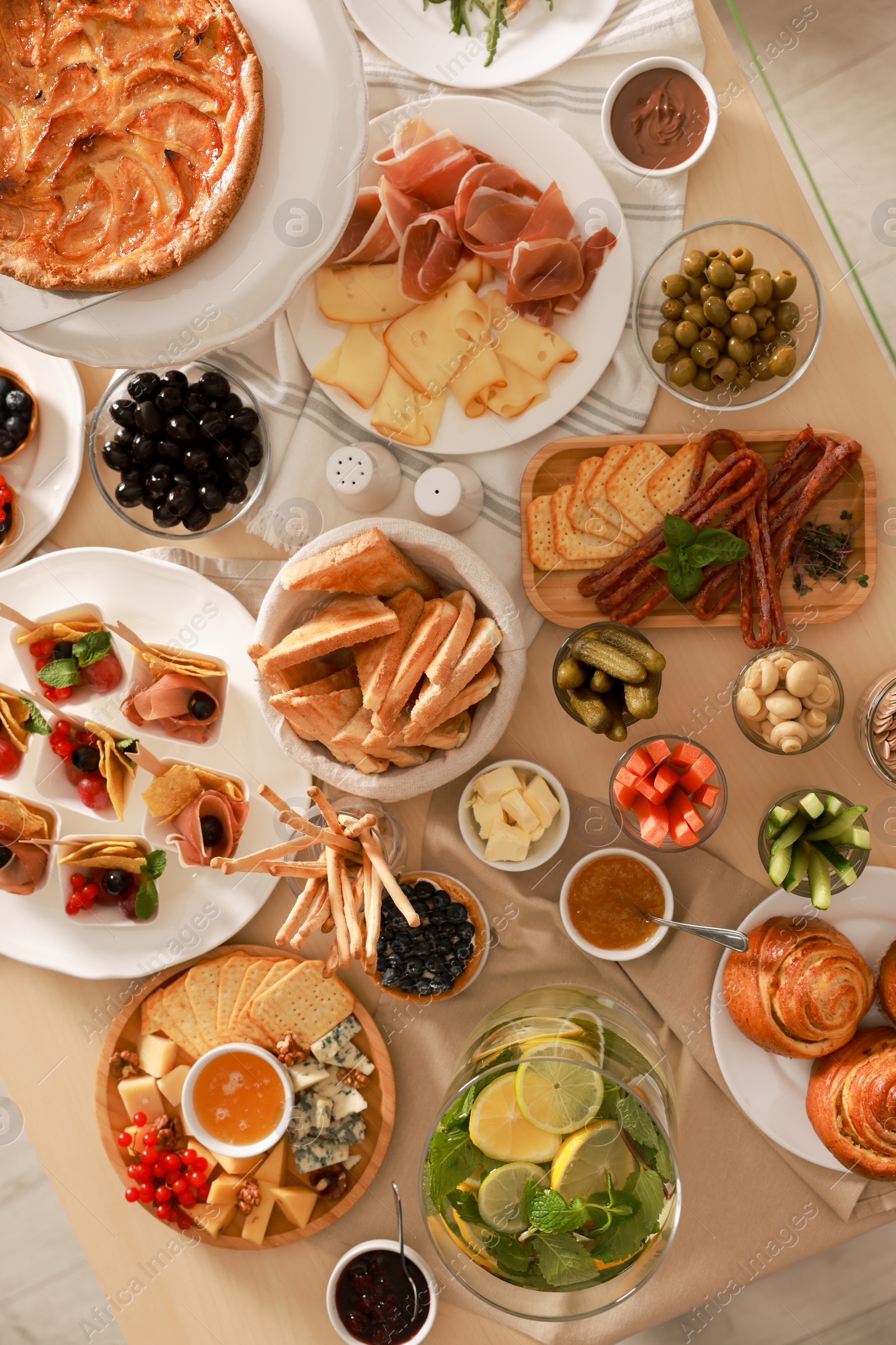 Photo of Dishes with different food on table, flat lay. Luxury brunch