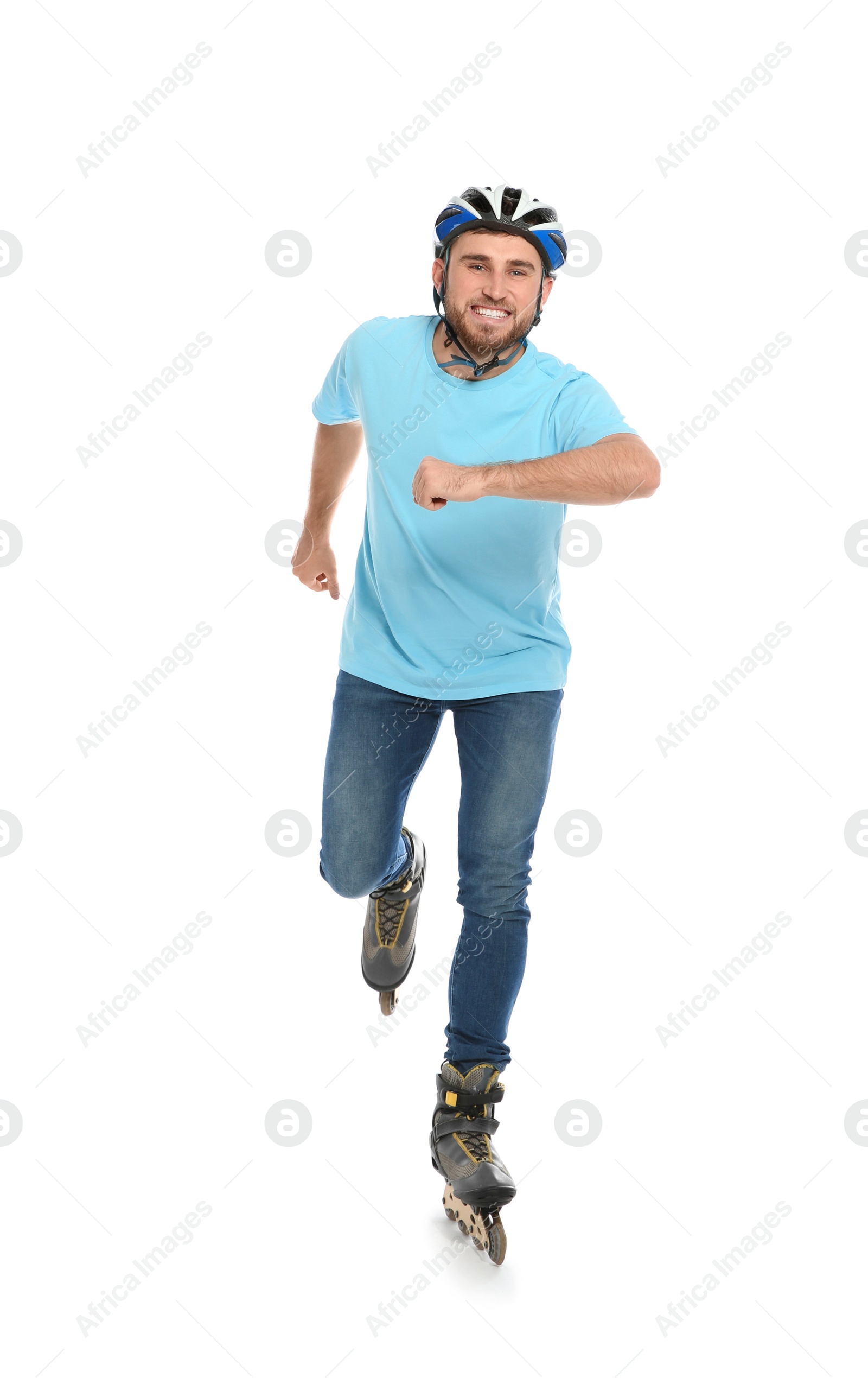 Photo of Young man with inline roller skates on white background