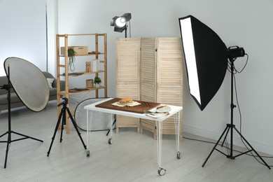 Photo of Tasty sandwich on table in photo studio. Food photography