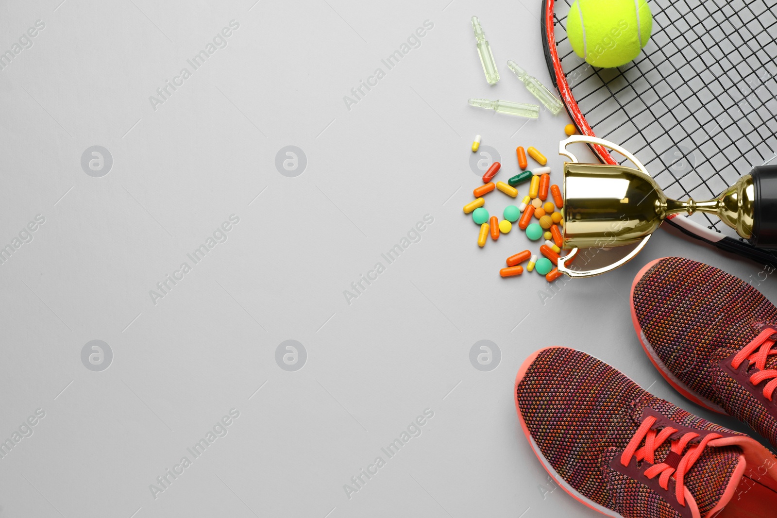 Photo of Flat lay composition with drugs on light grey background, space for text. Doping control