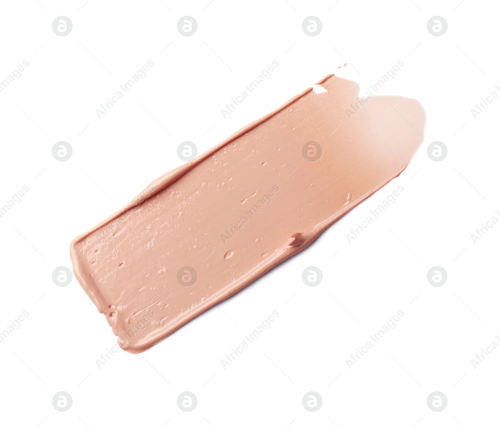 Photo of Stroke of pink correcting concealer isolated on white, top view