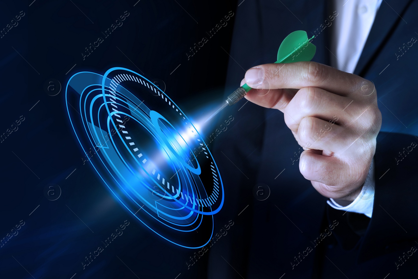 Image of Businessman aiming at digital target with dart against dark blue background, closeup