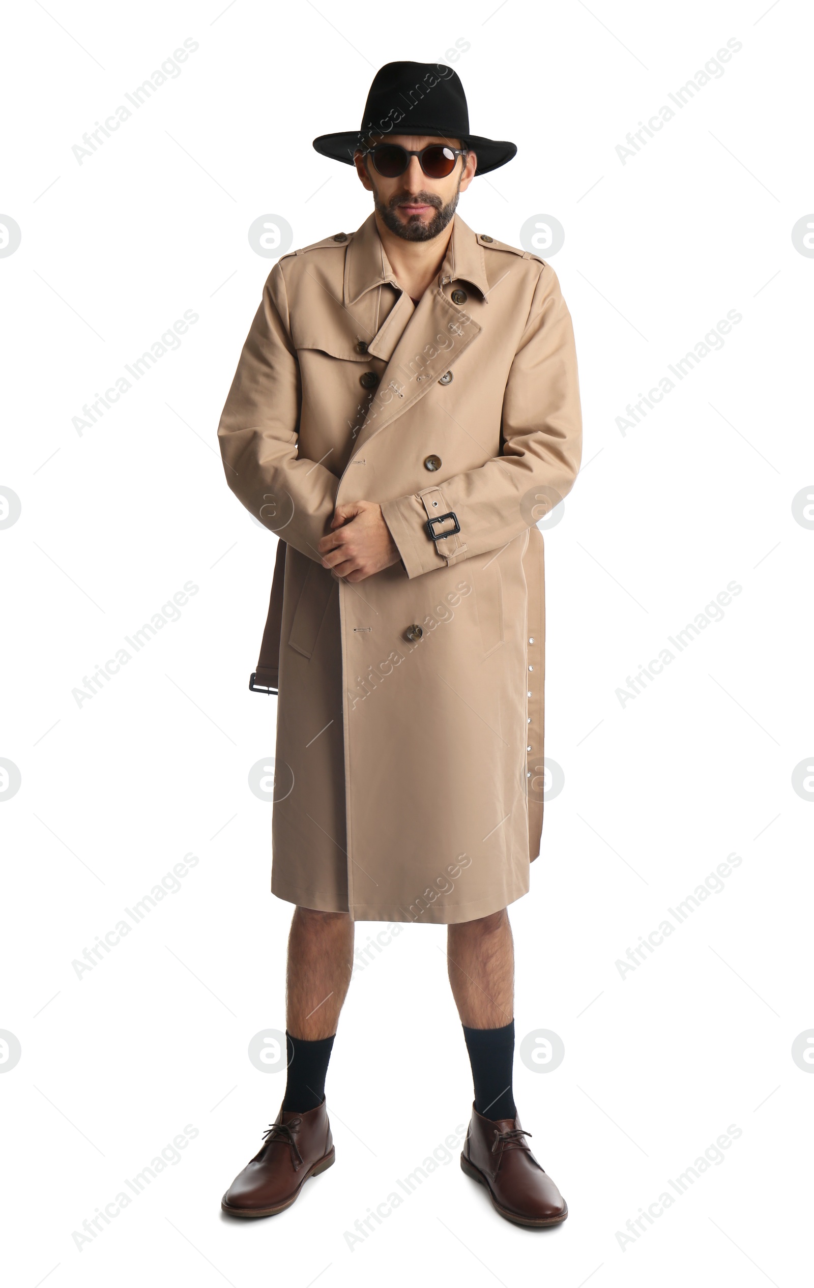 Photo of Exhibitionist in coat and hat isolated on white