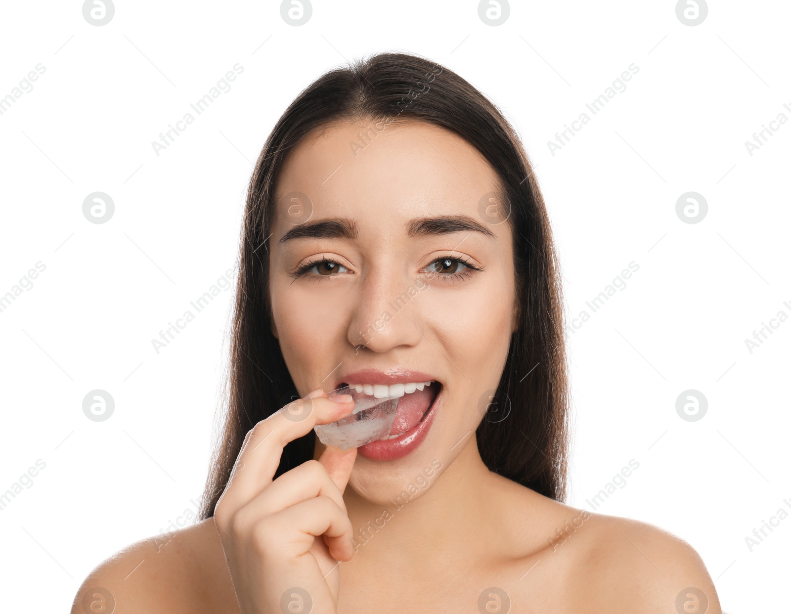 Photo of Young woman with ice cube on white background