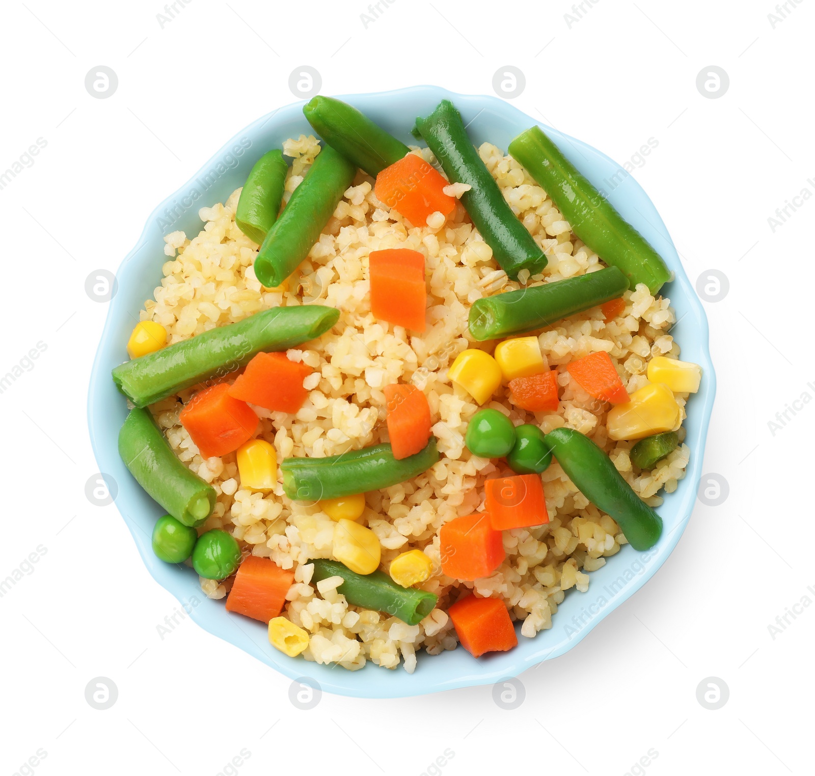 Photo of Delicious bulgur with vegetables in bowl isolated on white, top view