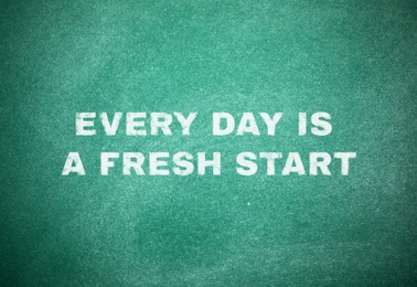 Image of Every Day Is A Fresh Start. Motivational quote inspiring to seize all opportunities. Text on green chalkboard